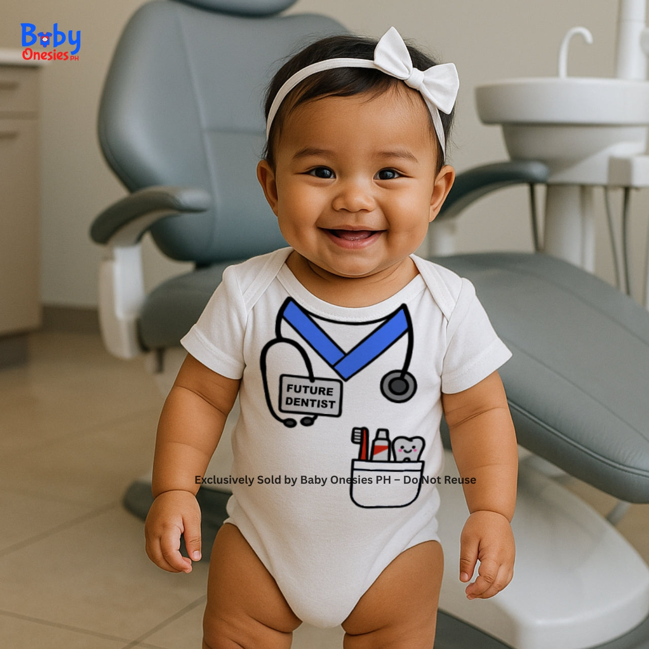 Baby wearing a 'Future Dentist' onesie in a dental office setting